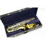 A late 20th century cased brass saxophone