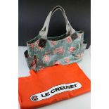 Cath Kidston Oilcloth Floral Handbag and a Le Creuset Bag