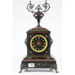 Victorian Slate and Marble Mantle Clock surmounted by an Urn Shaped Finial, raised on Metal Lion Paw