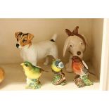 A Beswick Jack Russell dog a Sylvac dog and three Beswick birds.