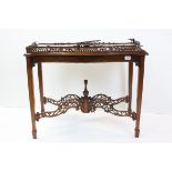 George III Style Mahogany ' Silver ' Table with fretwork gallery (damage to fretwork), h.71cms w.