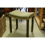 George VI Coronation Stool in limed oak with shaped padded seat, L.46cms h.47cms