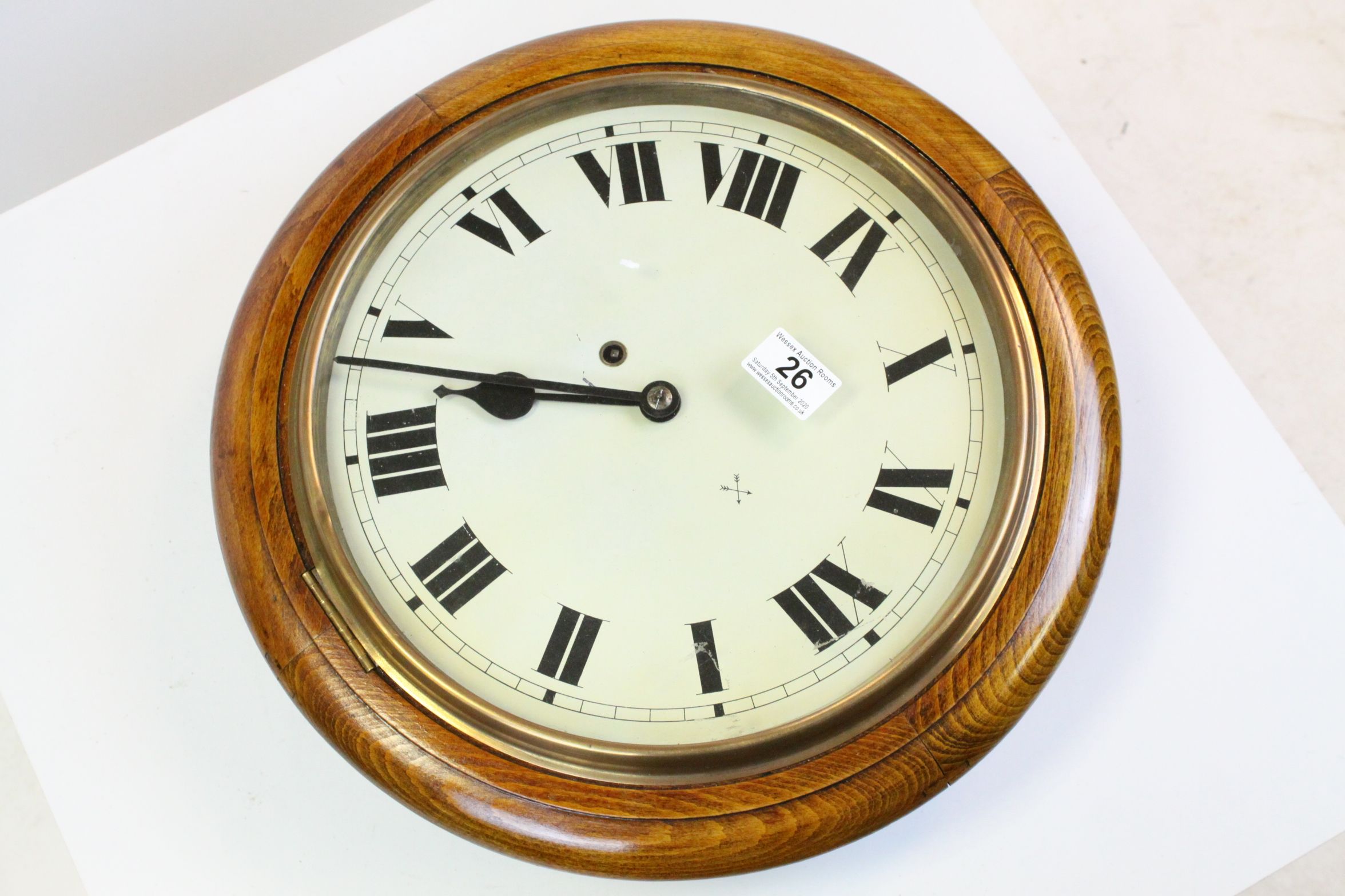 Late 19th / Early 20th century Oak Cased Circular ' School ' Type Wall clock with Roman Numerals