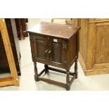 Mid 20th century Oak Jacobean Style Small Oak Cupboard with Carved Doors, h.69cms w.49cms