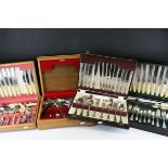 Four cased cutlery sets .