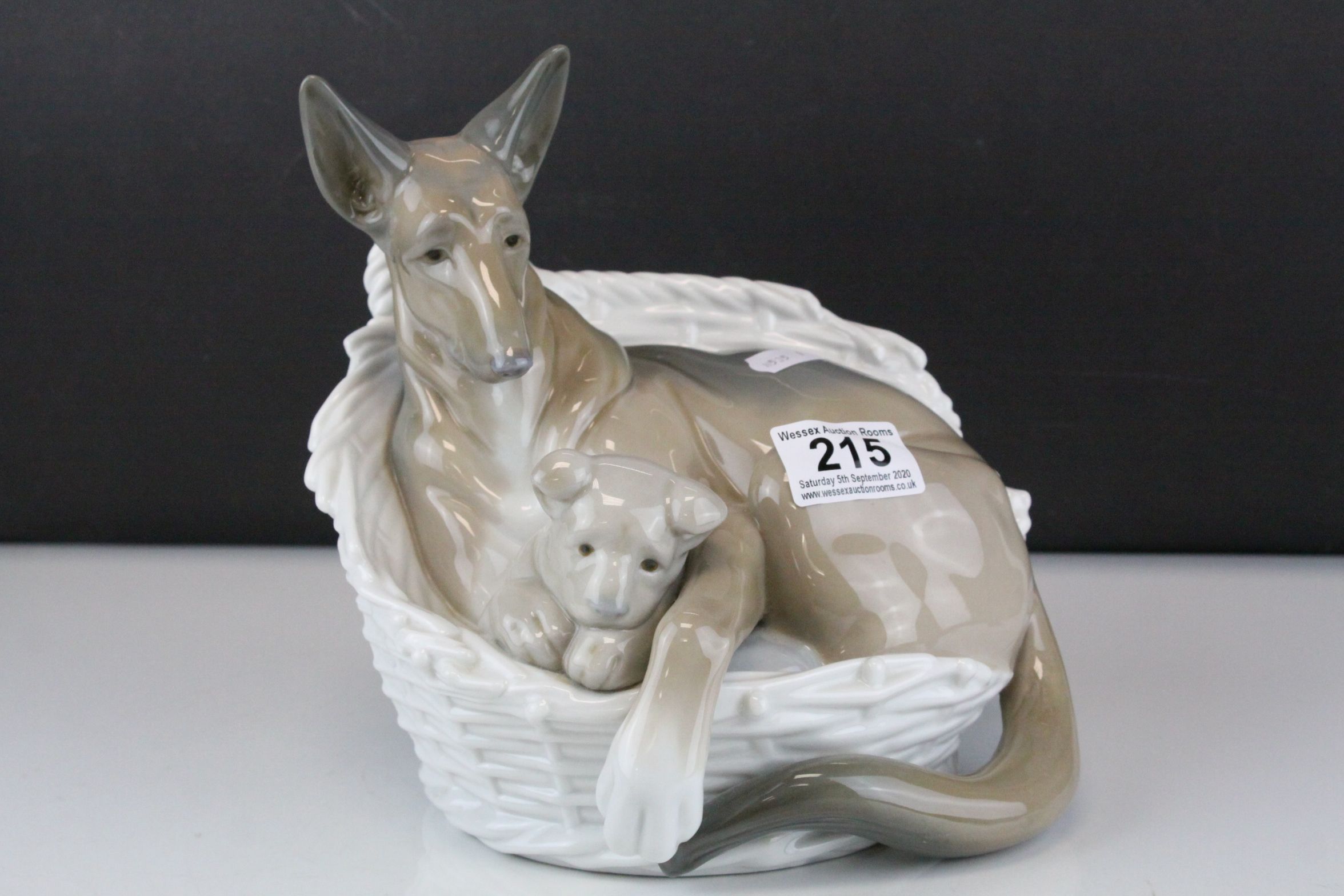 Large Lladro Model of an Alsatian Dog in a Basket with a Puppy, 23cms high