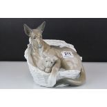 Large Lladro Model of an Alsatian Dog in a Basket with a Puppy, 23cms high