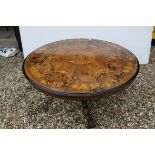 Victorian Walnut Marquetry Inlaid Circular Dining Table raised on a bulbous central support with