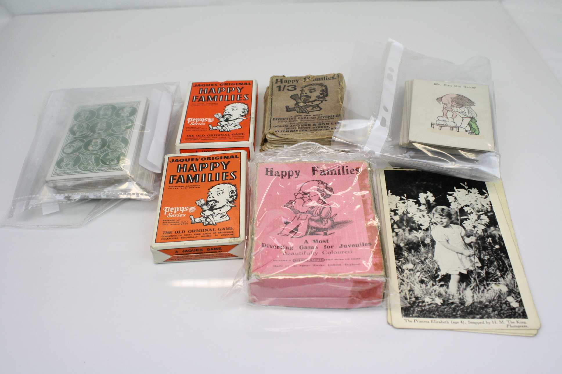 Collection of vintage playing cards to include Jaques Happy Families.