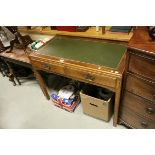 Early 20th century Oak Desk with Green Leather Inset Top, Two Drawers and raised on square legs, h.