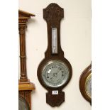 An oak cased mid century banjo barometer.