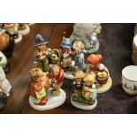 Five Goebel Hummel Figures including Easter Greeting, Doll Mother, Little Nurse Hansel merk dir 7