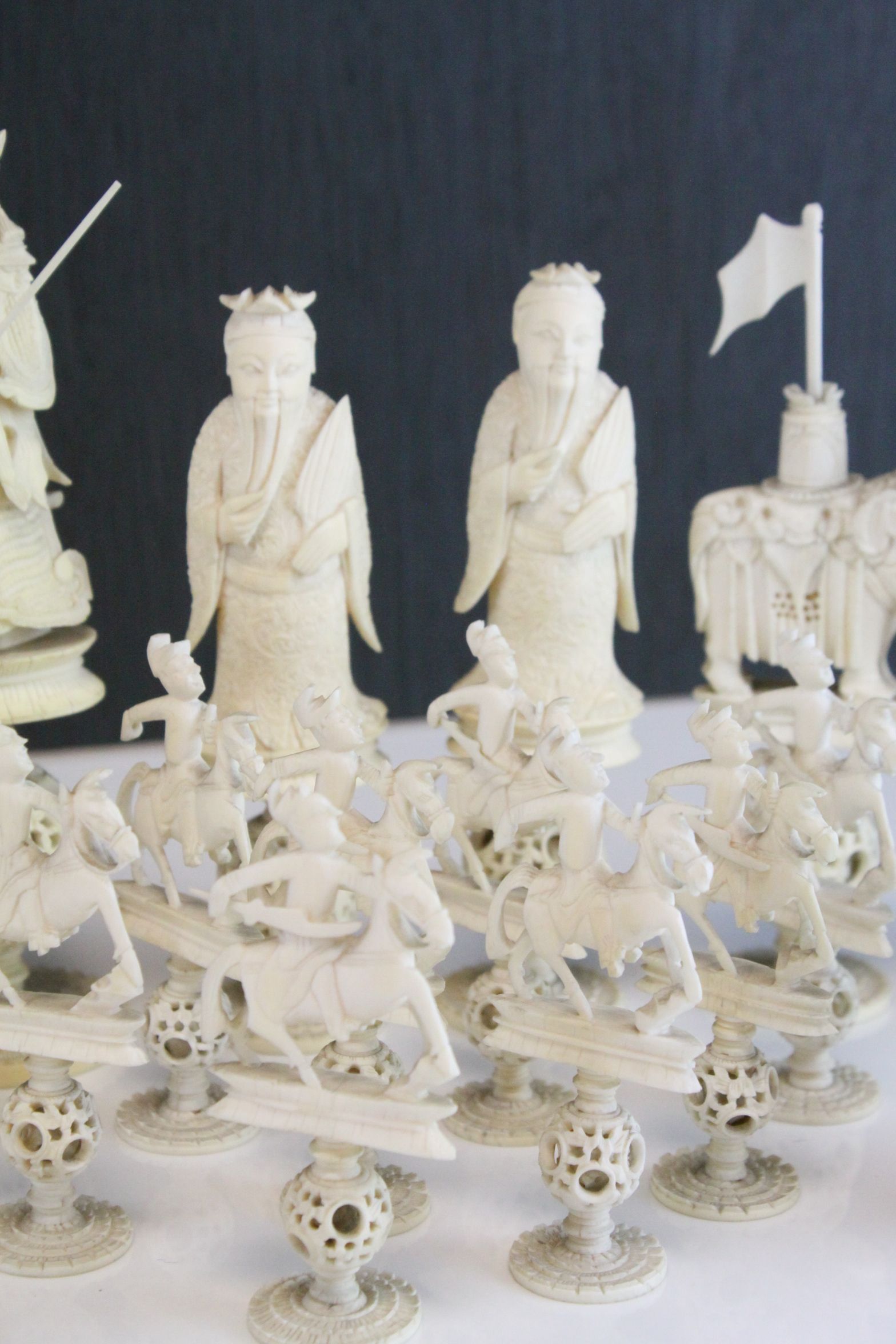 A 19th Century Chinese export carved ivory figural chess set, Canton. The white and red side - Image 12 of 26