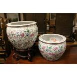 Two Contemporary Chinese Fish Bowls / Jardiniere, each decorated with flowers and foliage and
