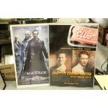 Two large film posters, Fight Club and The Matrix