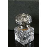 A fully hallmarked sterling silver topped glass scent bottle with maker mark for William Hutton &
