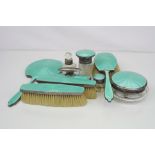 A fully hallmarked sterling silver and guilloche enamel dressing table vanity set (A/F).