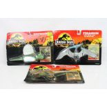 Three original carded Kenner Jurassic Park dinosaur figures to include Velociraptor, Pterandon and