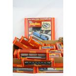 28 Boxed Hornby OO gauge items of rolling stock to include R128 Operating Helicopter Car, R126 Car