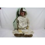 Large early 20th C Simon & Halbig K&R bisque headed doll, sleeping glass eyes, good teeth,