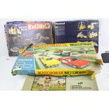 Four boxed games to include Subbuteo Cricket, Meccano 5, Parker Colditz and Matchbox Motorway M2,
