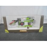 Boxed 1:32 Universal Hobbies Country 2665U Claas Tucano 450, diecast excellent and appearing