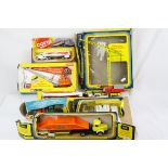 Seven Corgi diecast models all in boxes which are mainly showing damage and faults, models include