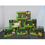 Six boxed Britains / Britains ERTL John Deere tractors and farming vehicles to include 7920, 8430T