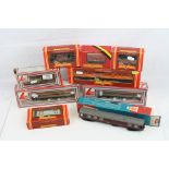 Nine boxed OO gauge items of rolling stock to include 5 x Hornby, 3 x Lima and Trix, a few tatty