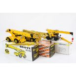 Three boxed NZG diecast construction models to include Grove RT760NZG 178 RT 45/50 and Sennebogen