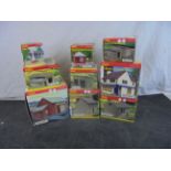 Nine boxed Hornby Skaledale trackside models to include D. Bird's Corner Shop, Strawson's Warehouse,