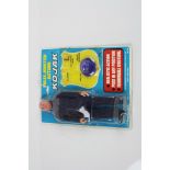 Excel Toy Corp Fully Jointed Kojak figure (1976) with bubble appearing to be re-sealed to card,