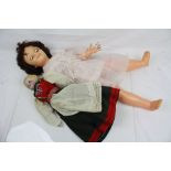 Early 20th C unmarked bisque headed doll in European dress, glass eyes, with original shoes, good