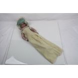 Late 19th early 20th C wax headed doll with sleeping eyes, unmarked, cloth bodied, good limbs,