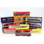13 Boxed OO gauge items of rolling stock, 12 x coaches and cars to include Bachmann x 6, Hornby x 5,