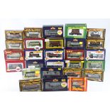 27 Boxed OO gauge items of rolling stock, all trucks and wagons to include Bachmann x 9, Replica