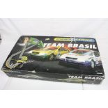 Boxed Scalextric Formula Ayrton Senna appearing complete with both slot cars, tatty box