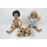 Two original Sasha dolls to include girl with original dress and boy (no outfit), good condition