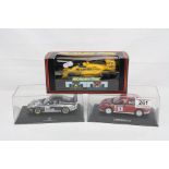 Three cased / boxed Scalectric slot cars to include C434 Lotus Honda Turbo, Mitsubishi WRC and New