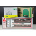 Three boxed HO gauge locomotives to include Lima 149836LK set, Trix 22551 BR E69 and Trix 22401 DR