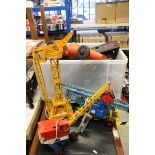 Three toy cranes, a Tonka lorry & a plastic racing car (5)