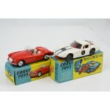 Two boxed Corgi diecast models to include 302 MGA Sports Car in red, and 324 Marcos 1800 GT with