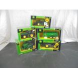 Five boxed Britains ERTL 1/32 diecast model tractors and vehicle to include 42458 9530T, 42370 9530,