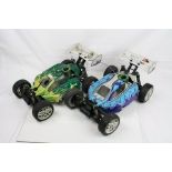 Two 4WD Ansmann Virus 21 Nitro 1/8 scale radio control buggys with Ansmann Racing 21 Nitro engines.