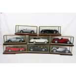 Eight cased 1:18 scale diecast model classic cars to include Rolls Royce, Mercedes, Jaguar etc,