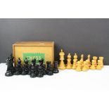 A boxed wooden chess set.