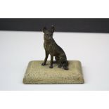Antique cold painted bronze figure in the form of a German Shepherd dog on a shagreen covered base.