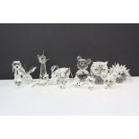 A collection of approx twelve loose Swarovski crystal animals to include a hedgehog, a swan and a