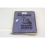The victory stamp album with contents to include British and world stamps.