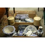 A large quantity of mainly blue and white china to include tureens, planters, jugs, bowls plates